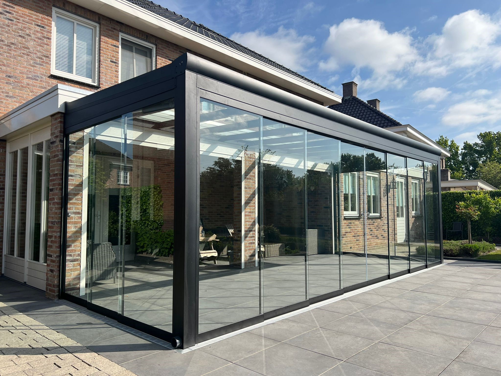 Glazen schuifwanden veranda